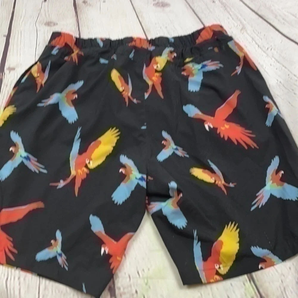 UEC men’s XL parrot swim trunks by No Retreat